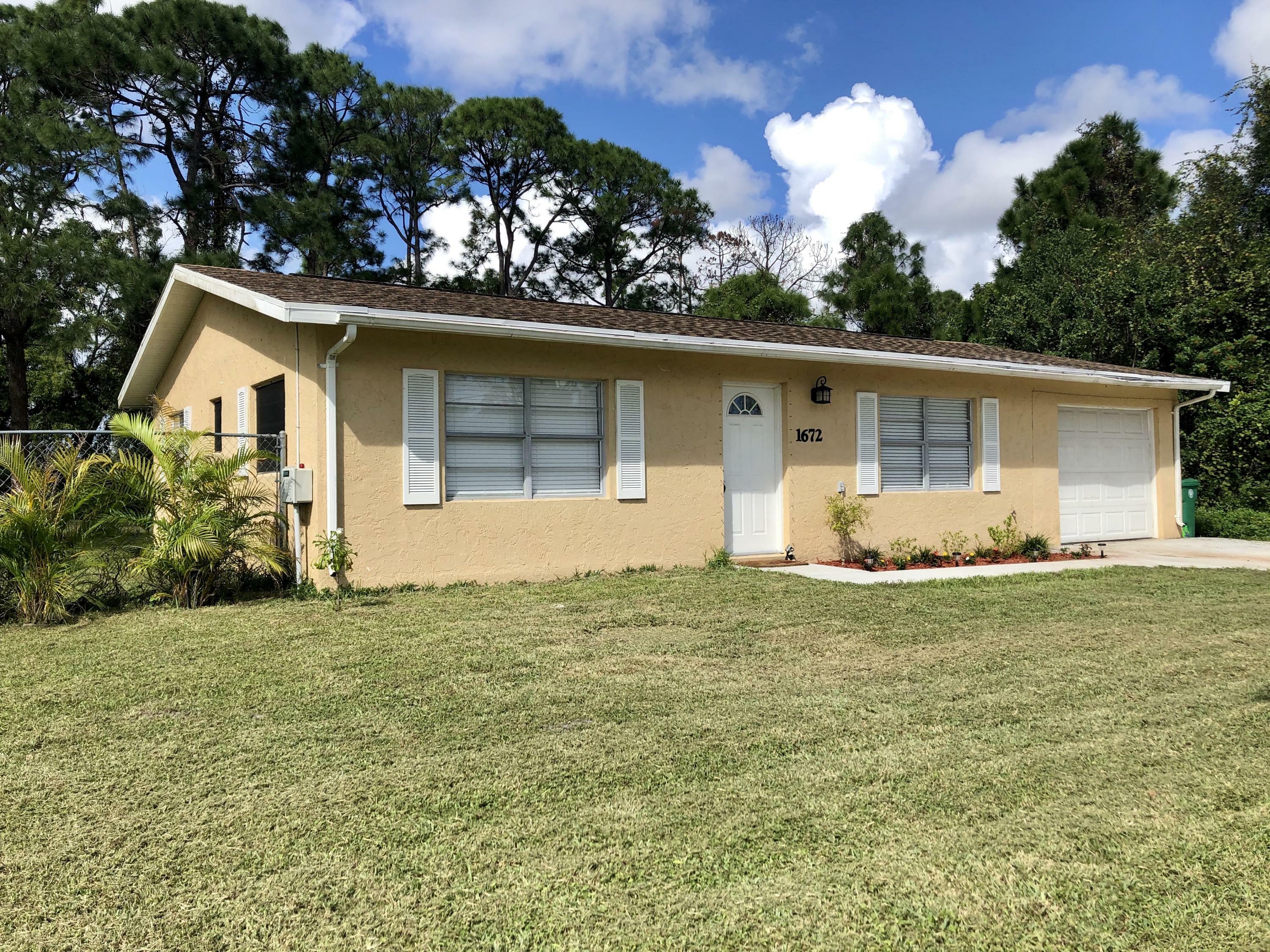 Property Photo:  1672 SE Floresta Drive  FL 34983 