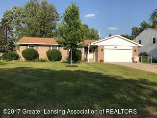 Property Photo:  411 Green Meadows Drive  MI 48917 