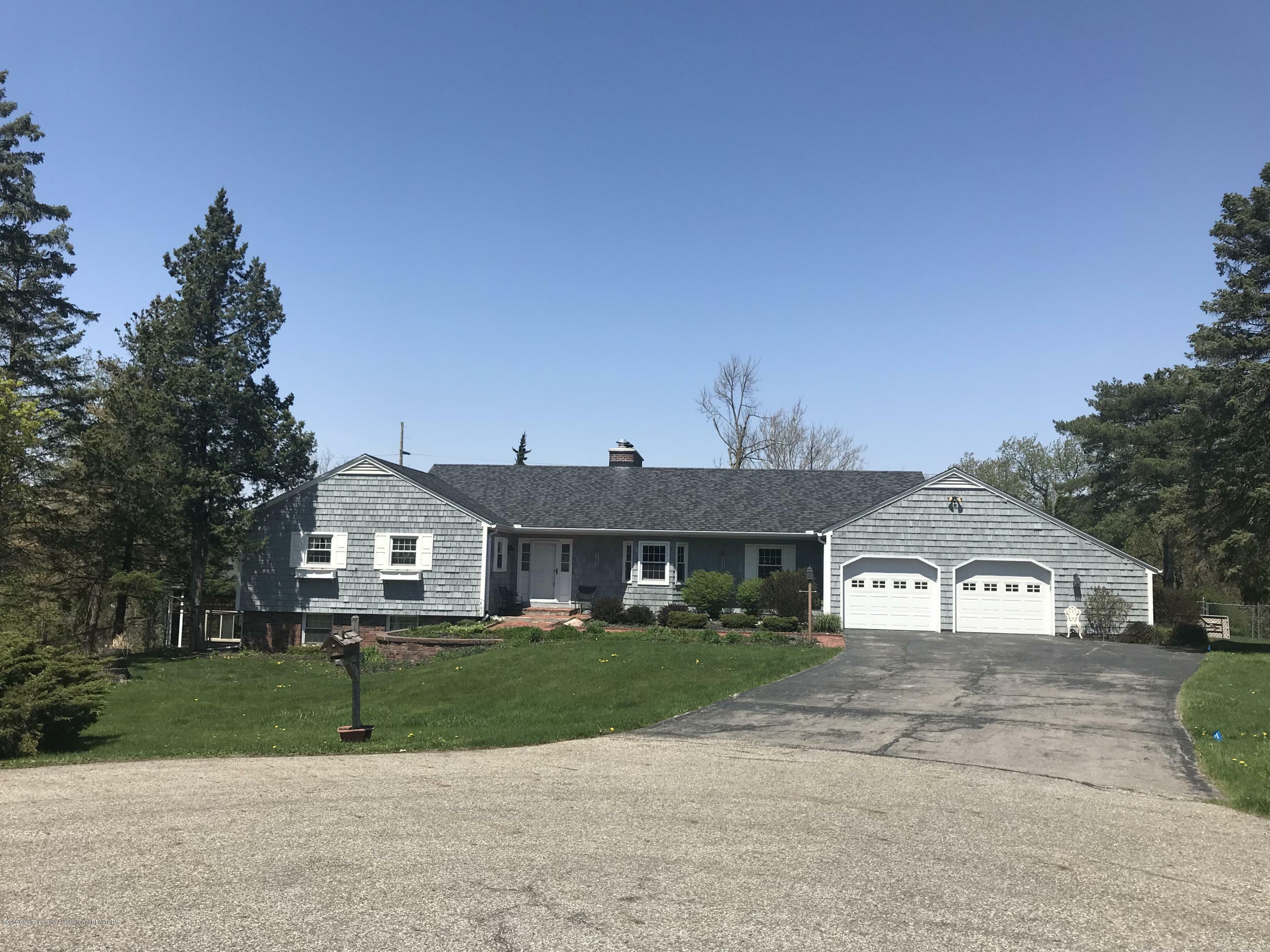 Property Photo:  4426 Barton Drive  MI 48917 