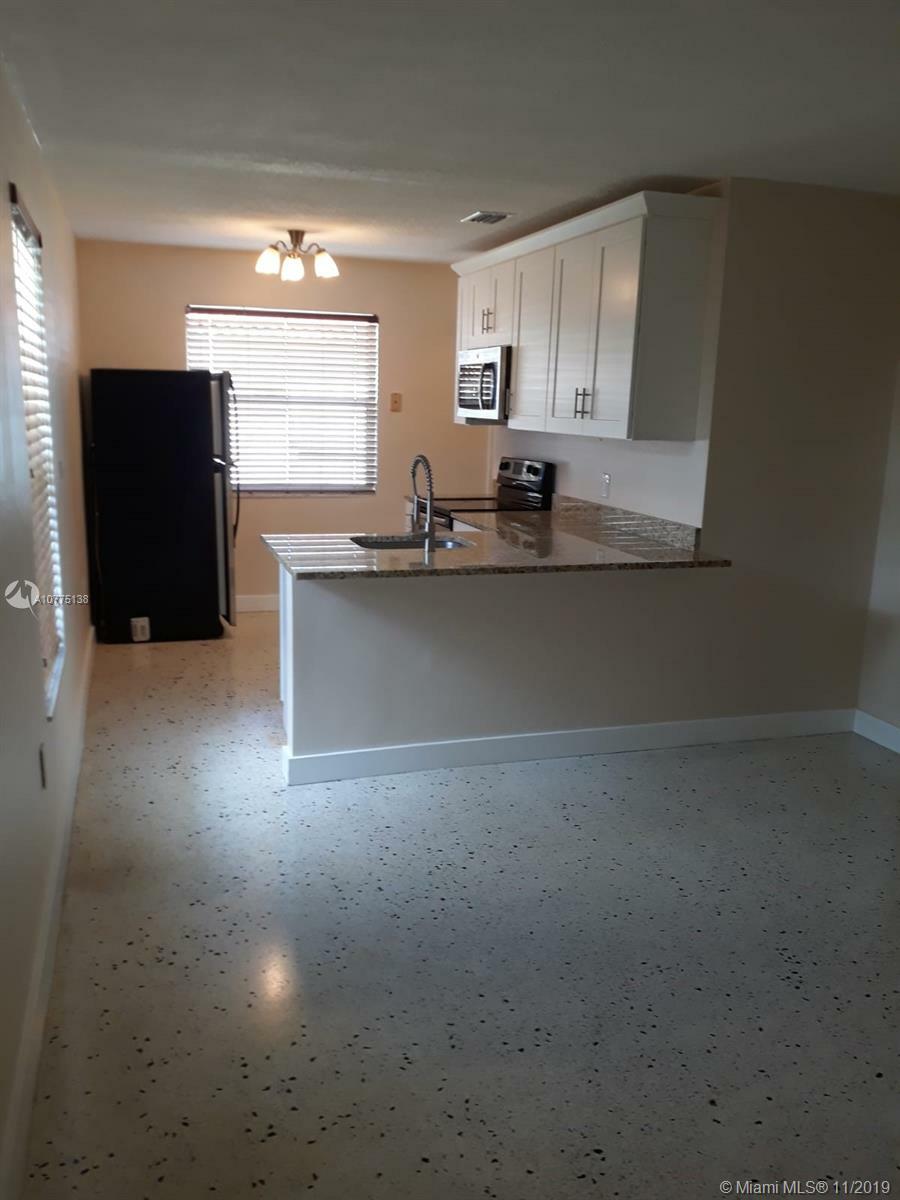 Property Photo:  301 NW 25th Ct 301  FL 33125 