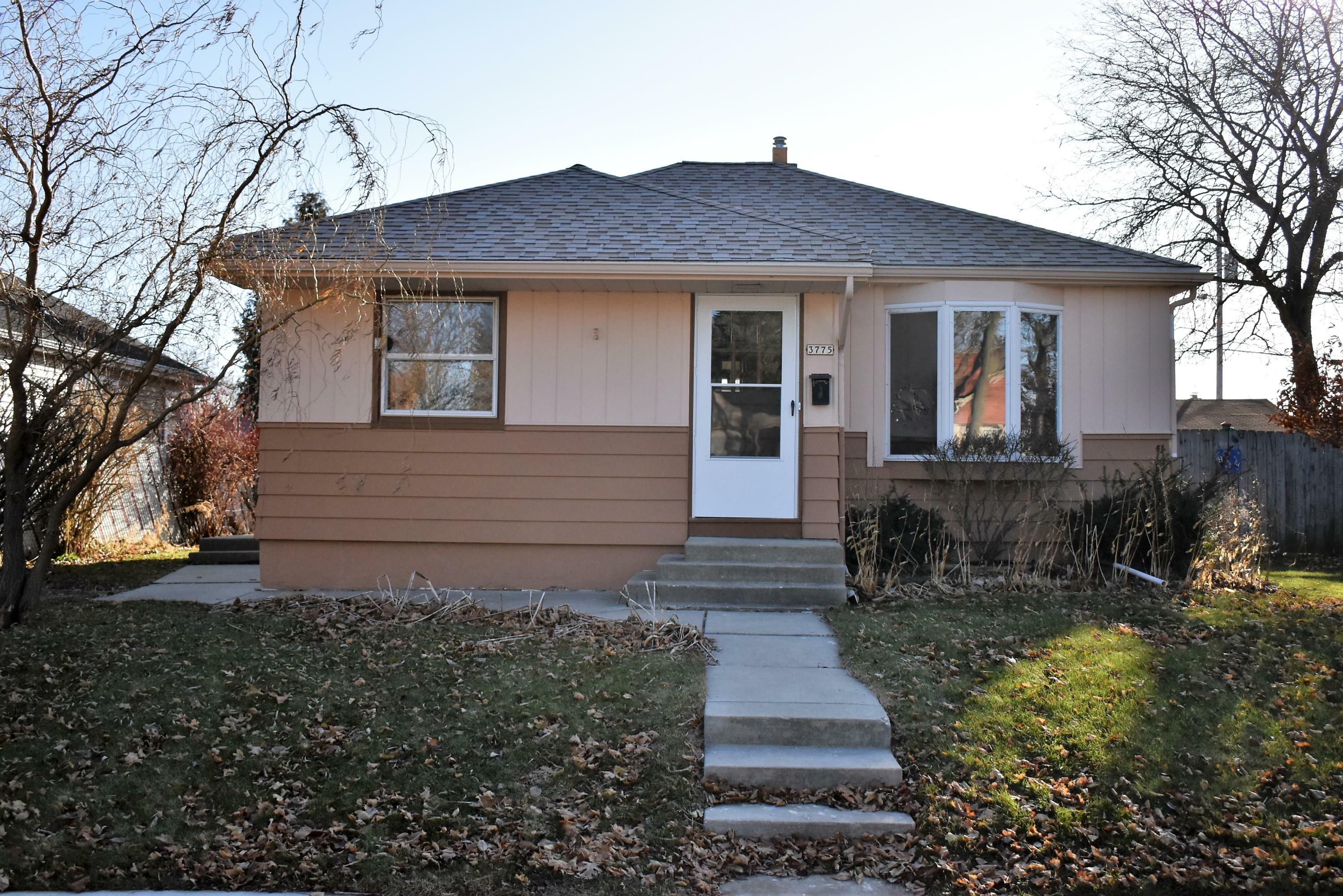 Property Photo:  3775 E Adams Ave  WI 53110 