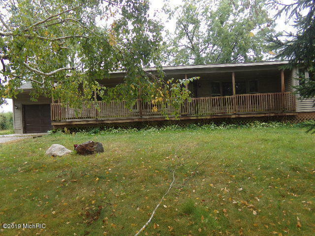 Property Photo:  3976 12 Mile Road NW  MI 49345 