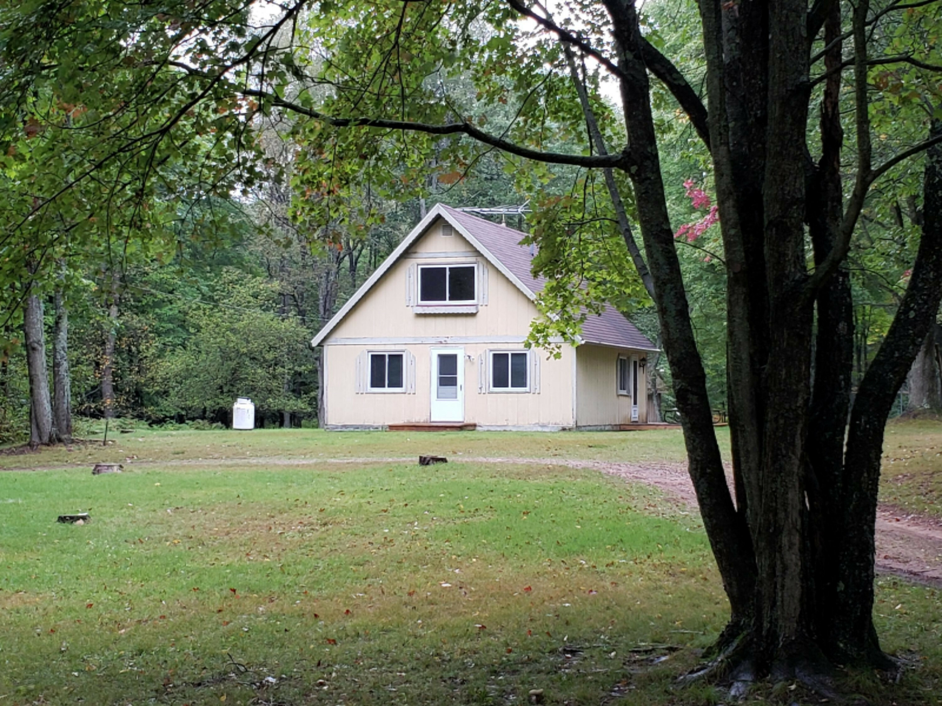 Property Photo:  6067 E 2 Mile Road  MI 49349 