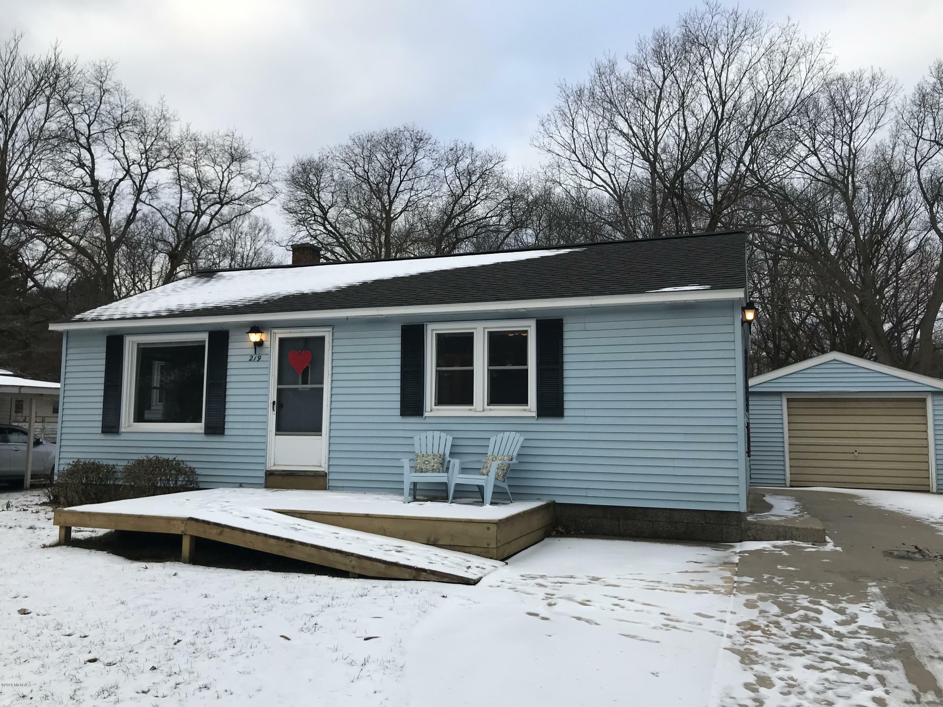 Property Photo:  219 S Fruitport Road  MI 49456 