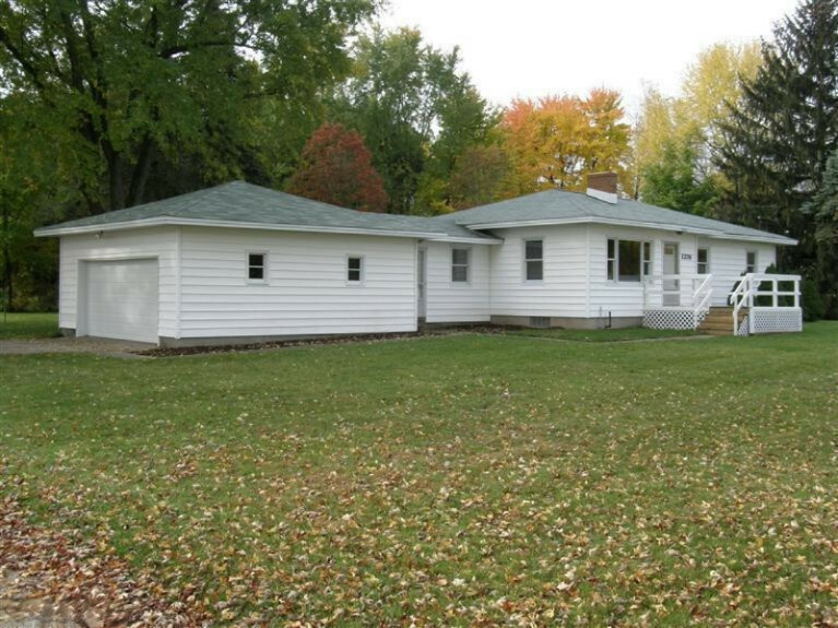 Property Photo:  1376 17 Mile Road  MI 49330 