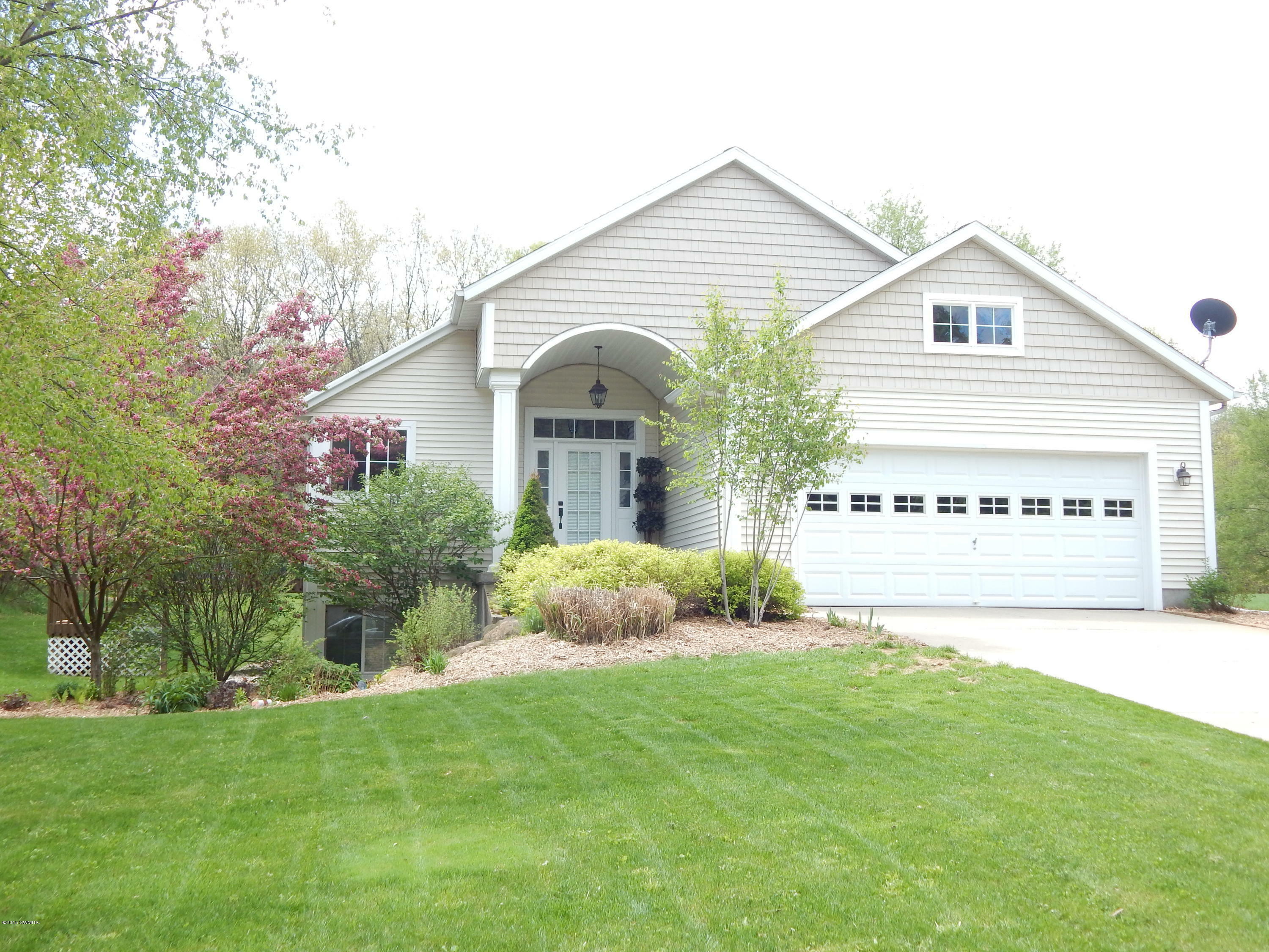 Property Photo:  12322 Holmden Drive NE  MI 49341 