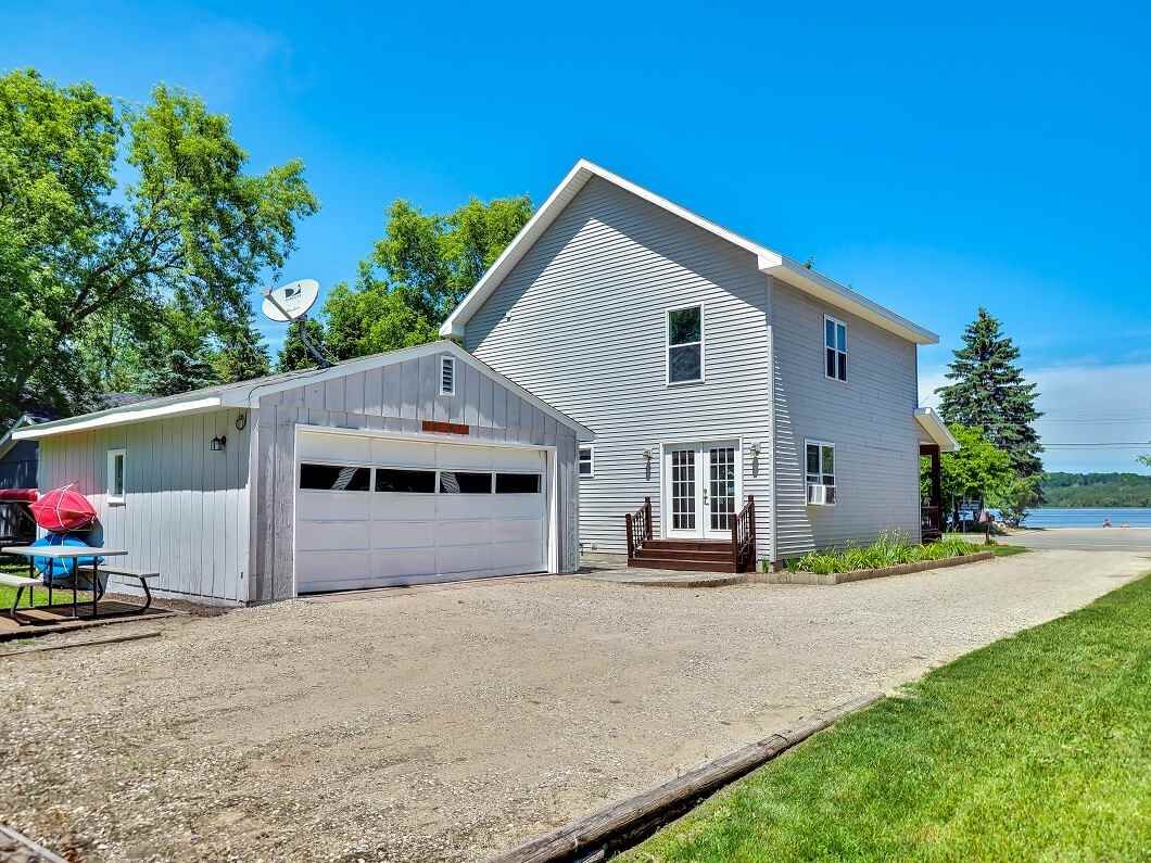 Property Photo:  303 Lake  MI 49727 