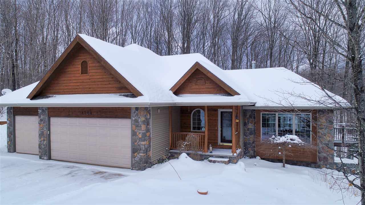 Property Photo:  6155 Forest Ridge  MI 49740 