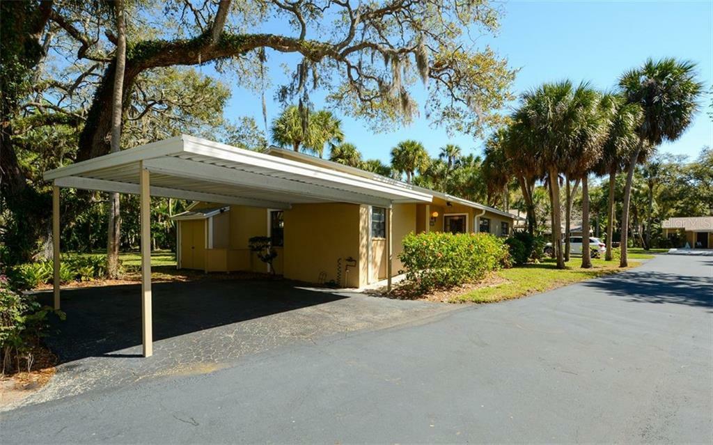 Property Photo:  5057 Village Gardens Drive 12  FL 34234 