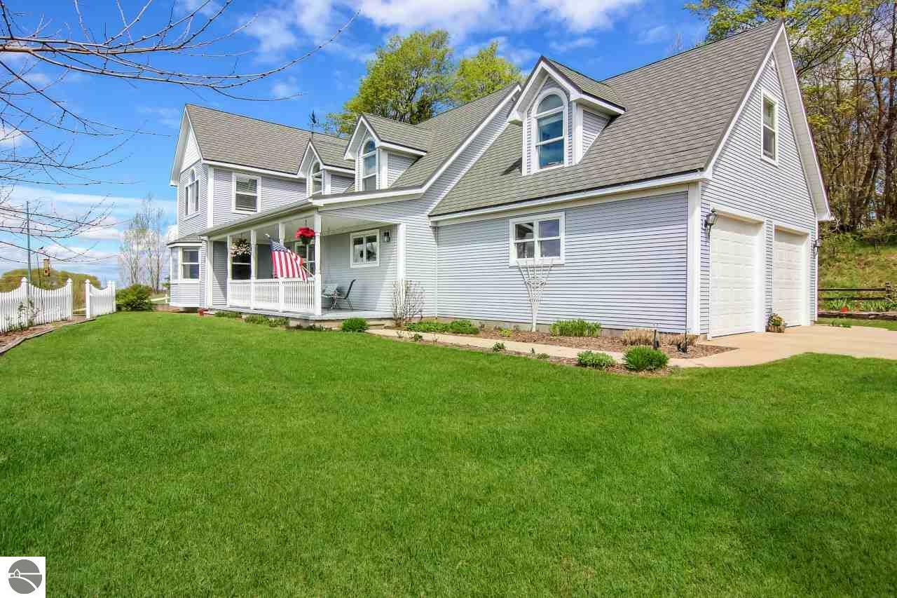 Property Photo:  5679 North Long Lake Road  MI 49685 