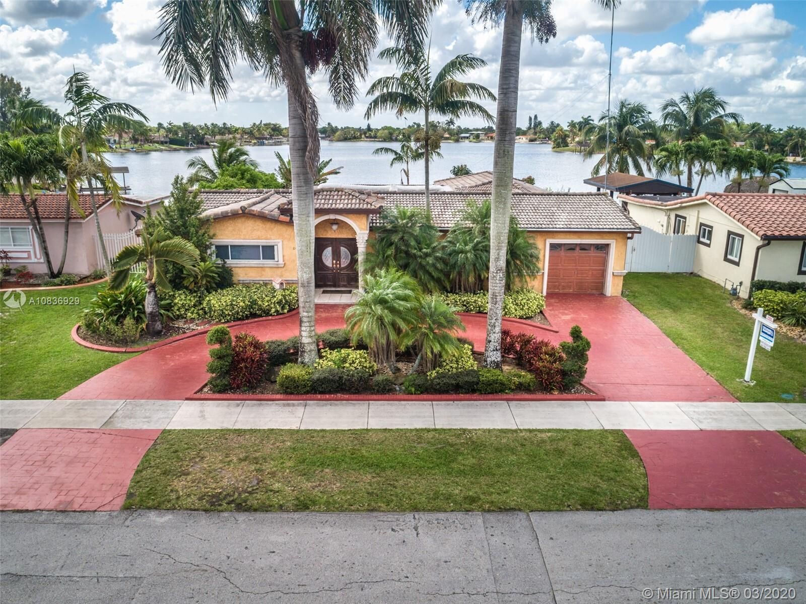 Property Photo: 8440 NW 185th St FL 33015