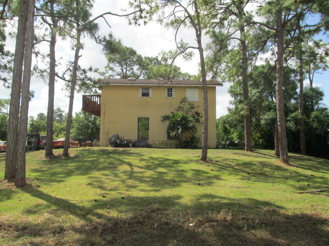 Property Photo:  17810 64th Place N  FL 33470 