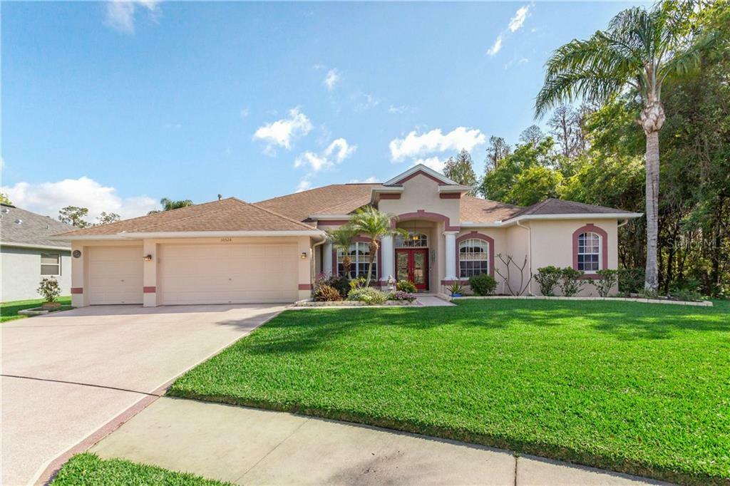 Property Photo: 30524 Treyburn Loop FL 33543