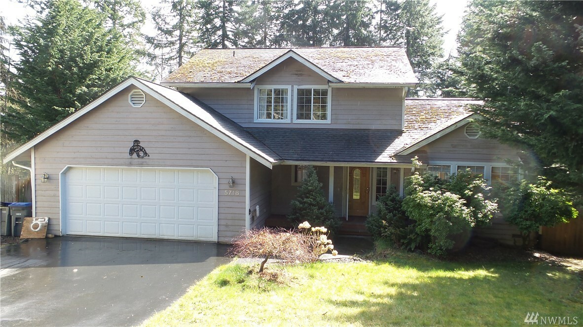 Property Photo:  5718 SE Woodland Ct  WA 98366 