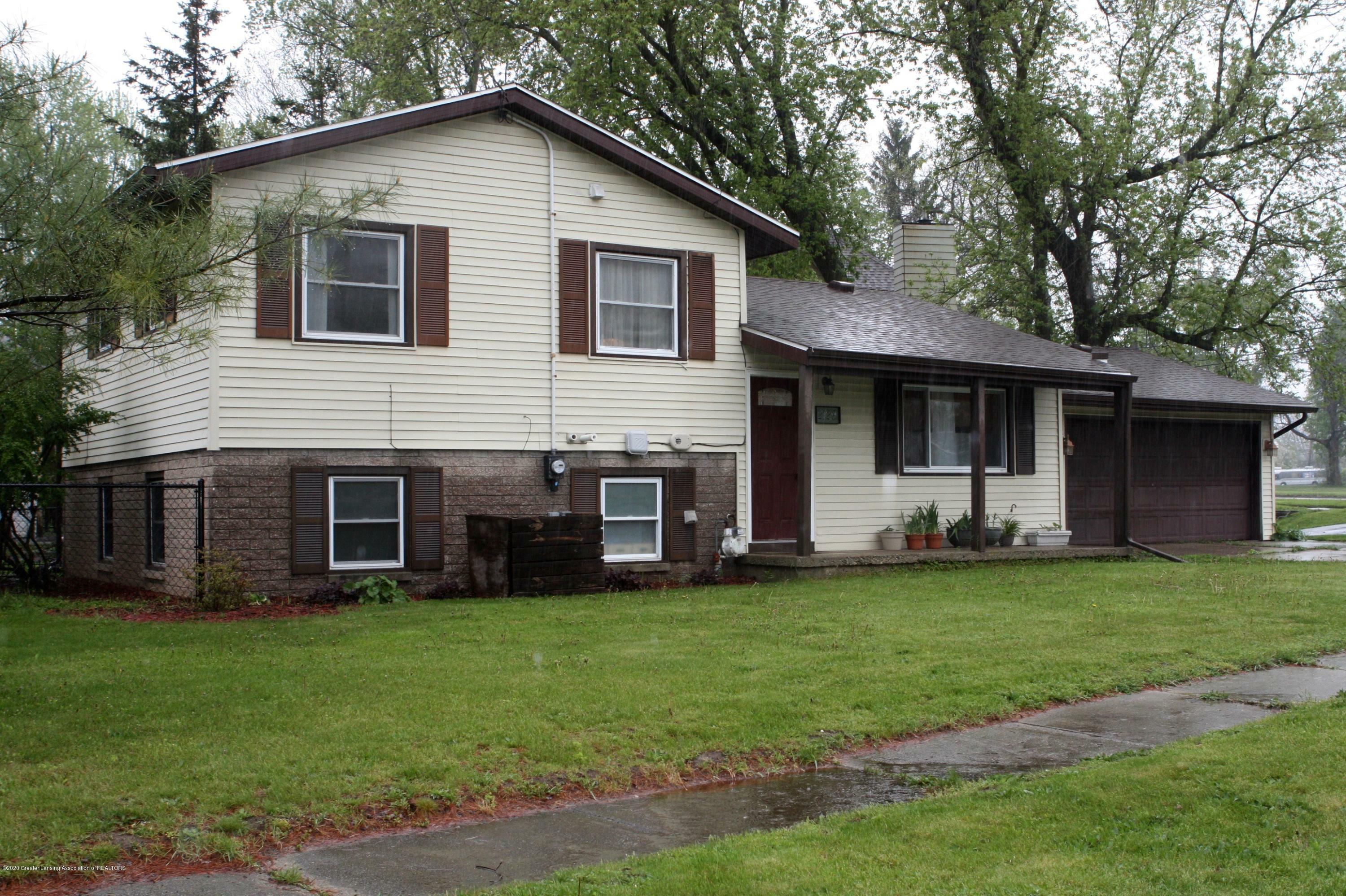 Property Photo:  2129 Riverside Court  MI 48906 