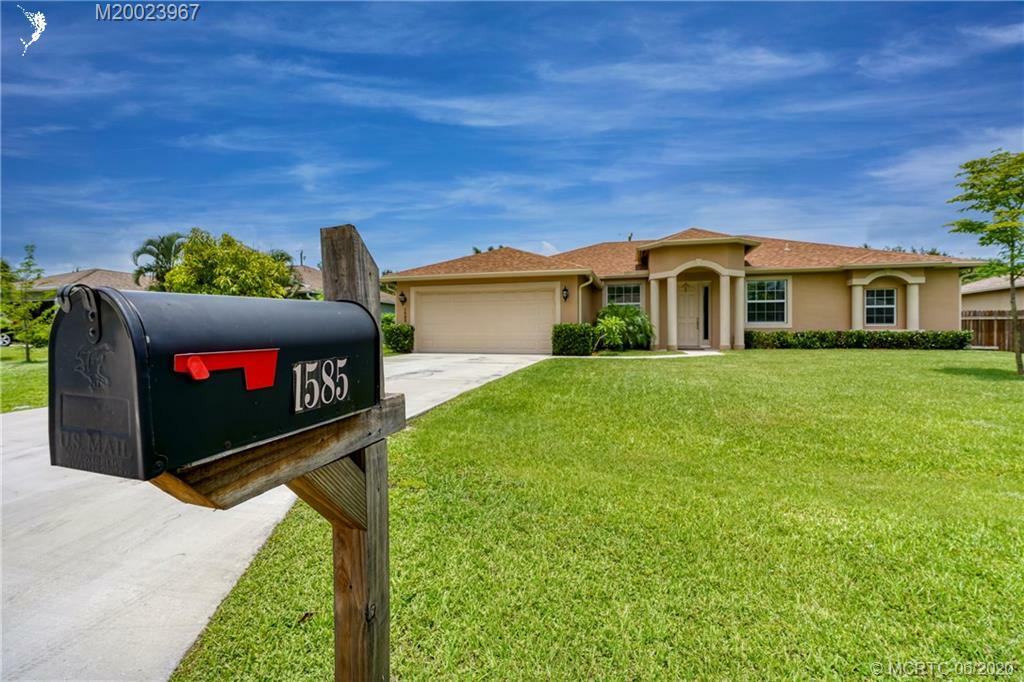 Property Photo:  1585 SW Merchant Lane  FL 34953 