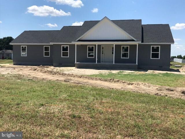 Property Photo: 32750 Tussock Drive DE 19956