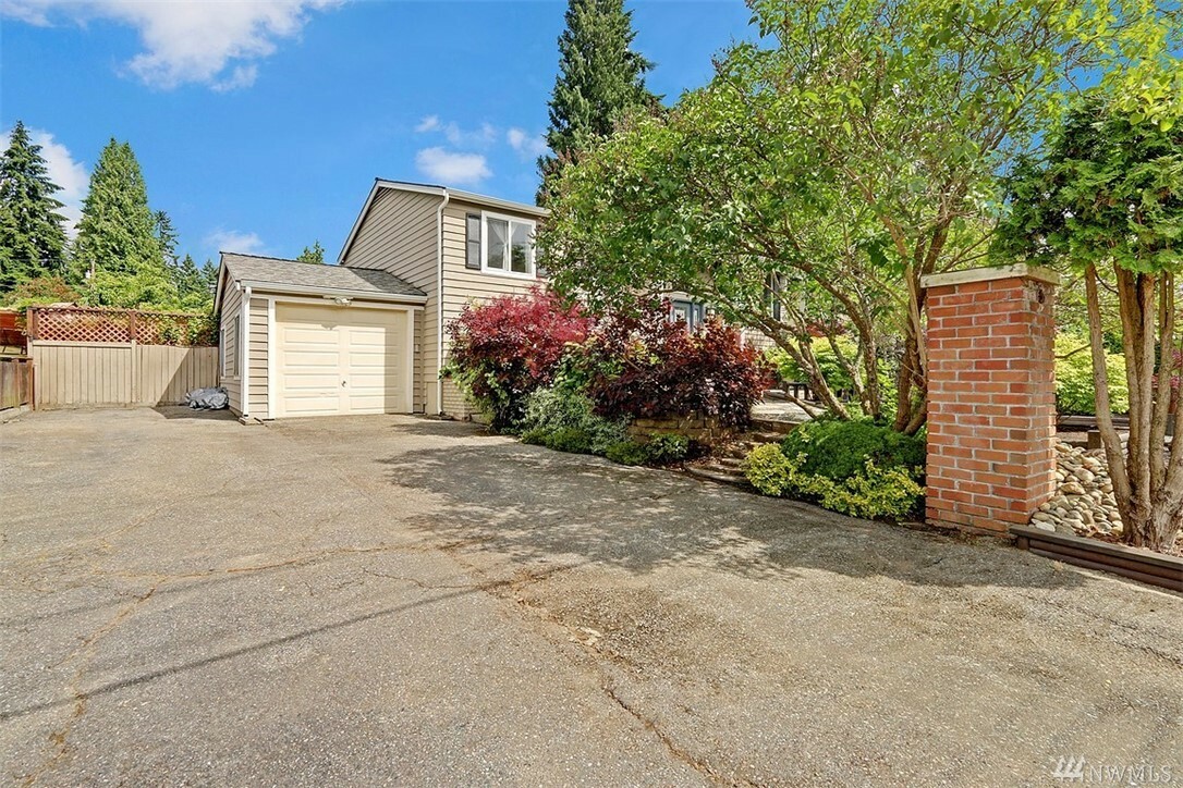 Property Photo:  16425 64th Ave W  WA 98037 