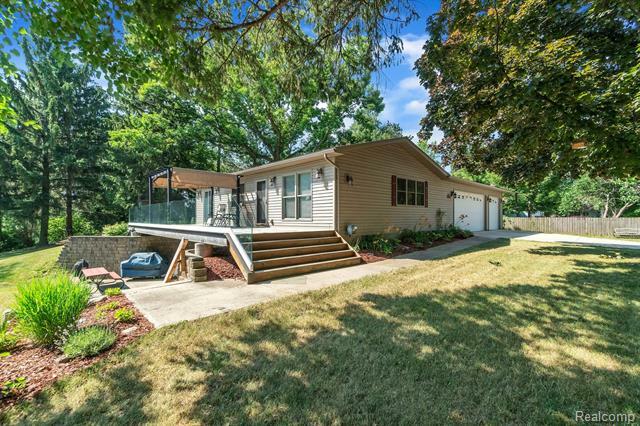 Property Photo:  417 Chicago Drive  MI 48843 