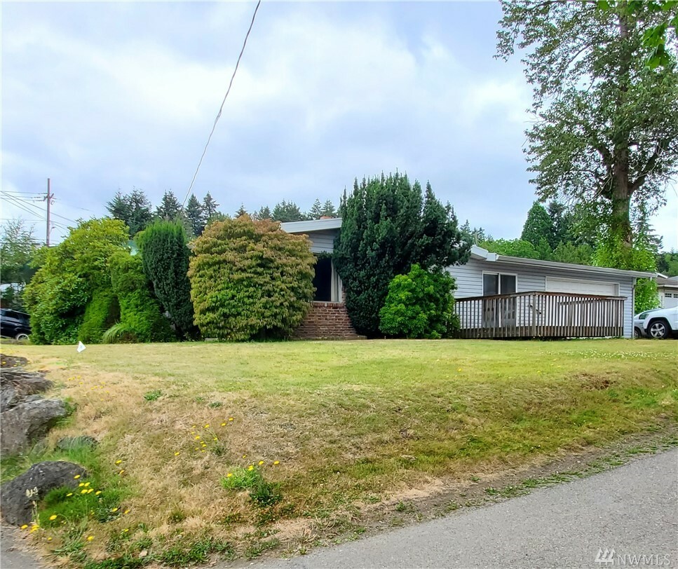 Property Photo:  12710 64th Ave S  WA 98178 