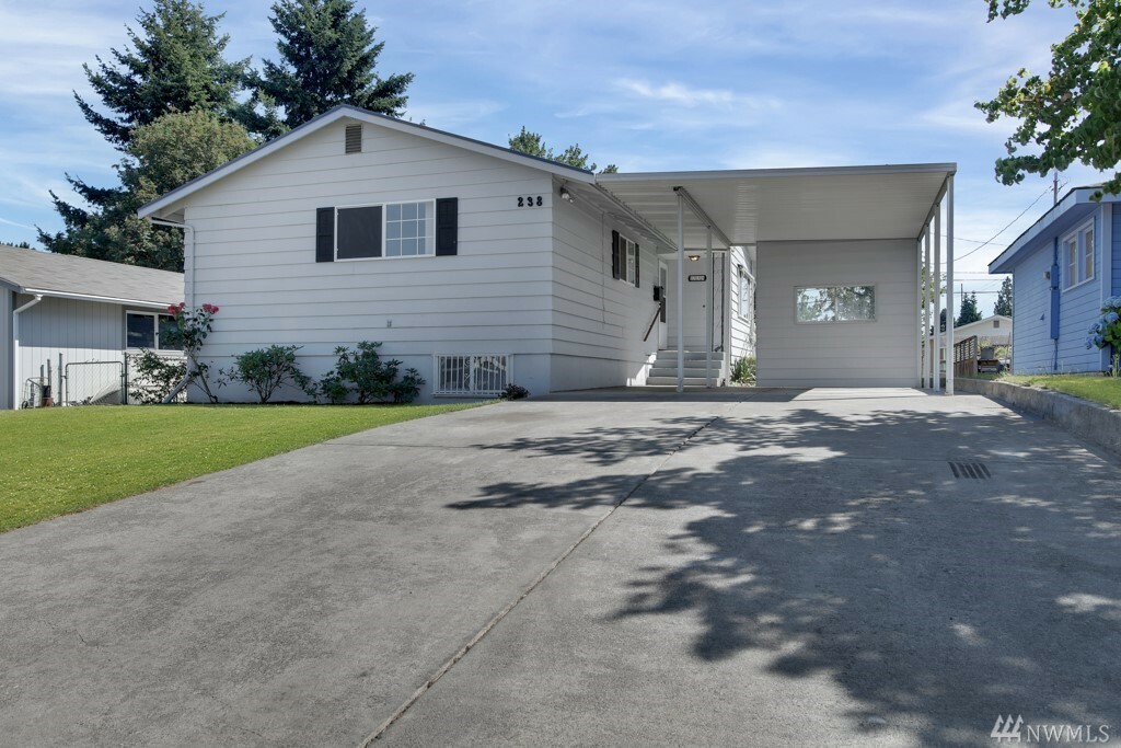 Property Photo:  238 E 61st  WA 98404 