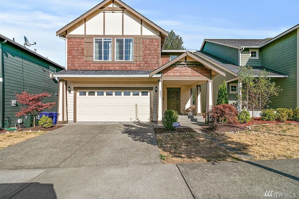 Property Photo:  4231 E Roosevelt Avenue  WA 98404 