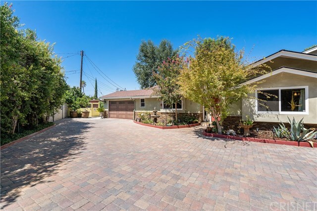 Property Photo: 22659 Hatteras Street CA 91367