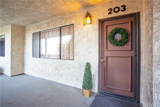 Property Photo:  7715 Newman Avenue 203  CA 92647 