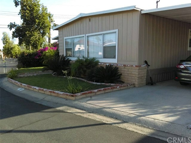 Property Photo:  1400 W 13th Street 155  CA 91786 