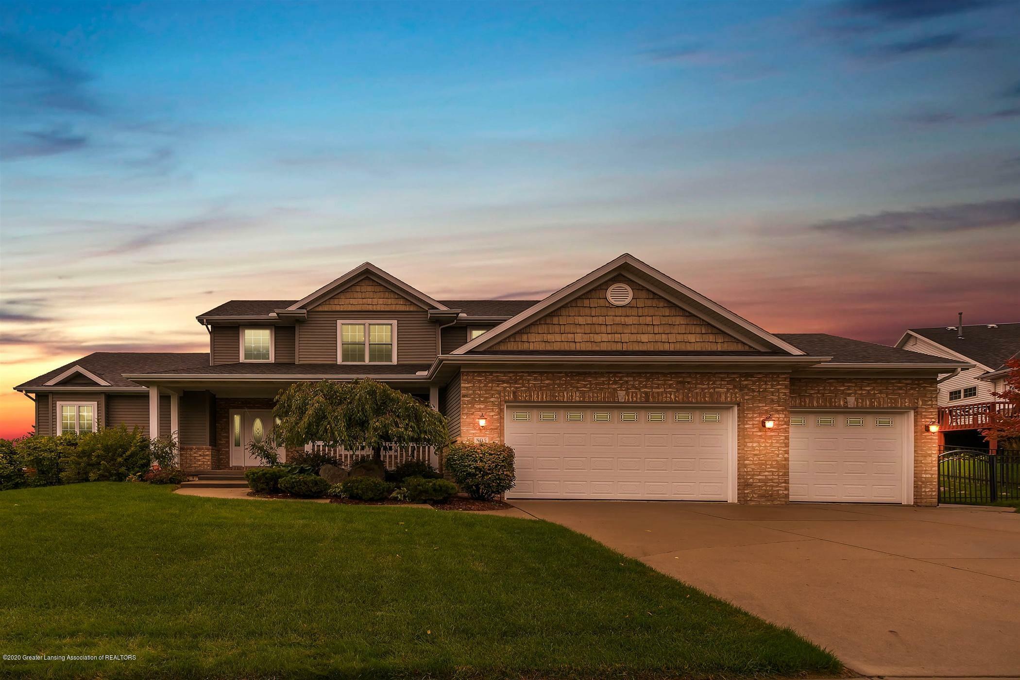 Property Photo: 805 Woodbury Drive MI 48837
