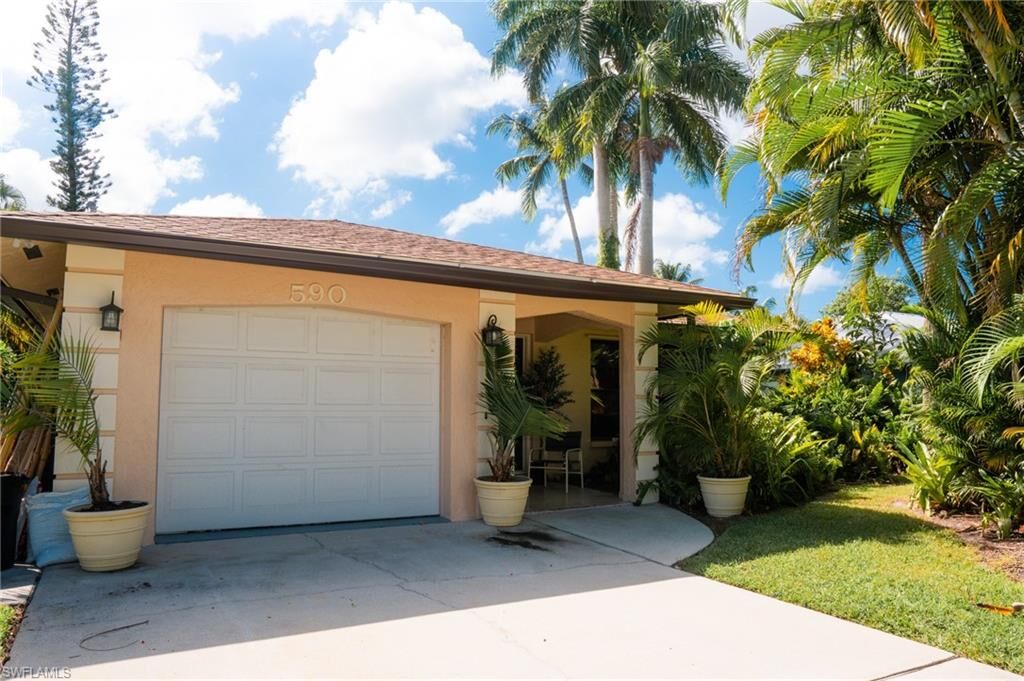 Property Photo:  590 104th Ave N  FL 34108 