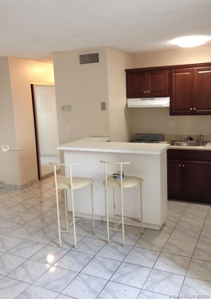 Property Photo:  5055 NW 7th St 805  FL 33126 