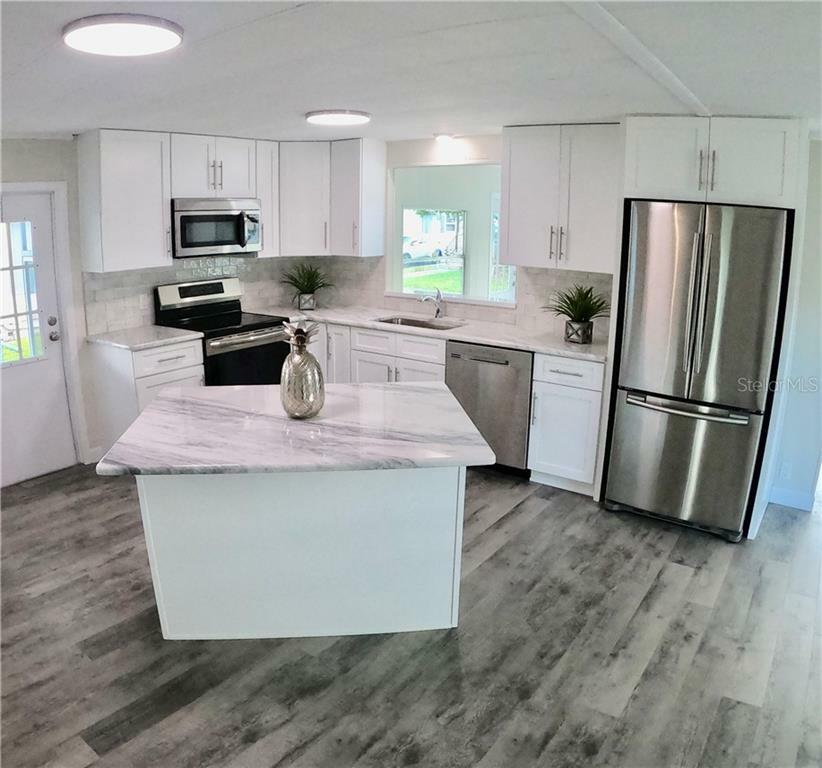 Property Photo: 125 Dolphin Drive S FL 34677