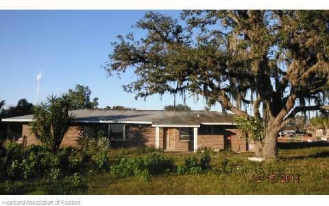 Property Photo:  6032 Mike Kahn Road  FL 33870 