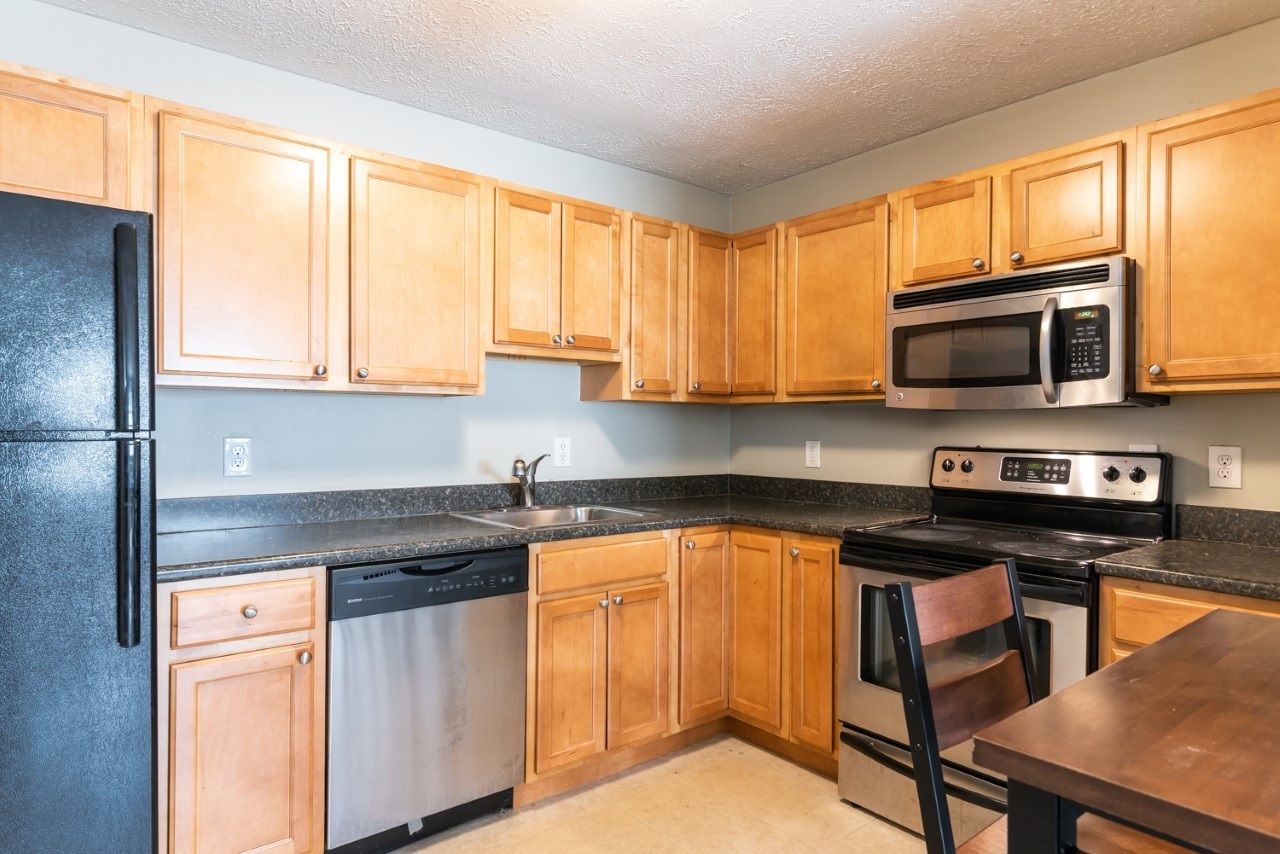 Property Photo: 64 Dunbarton Road 1E NH 03102