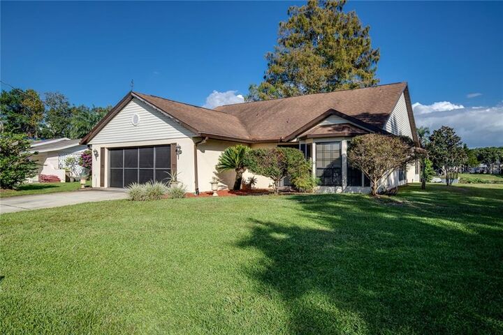 Property Photo:  26620 Cayman Drive  FL 32778 