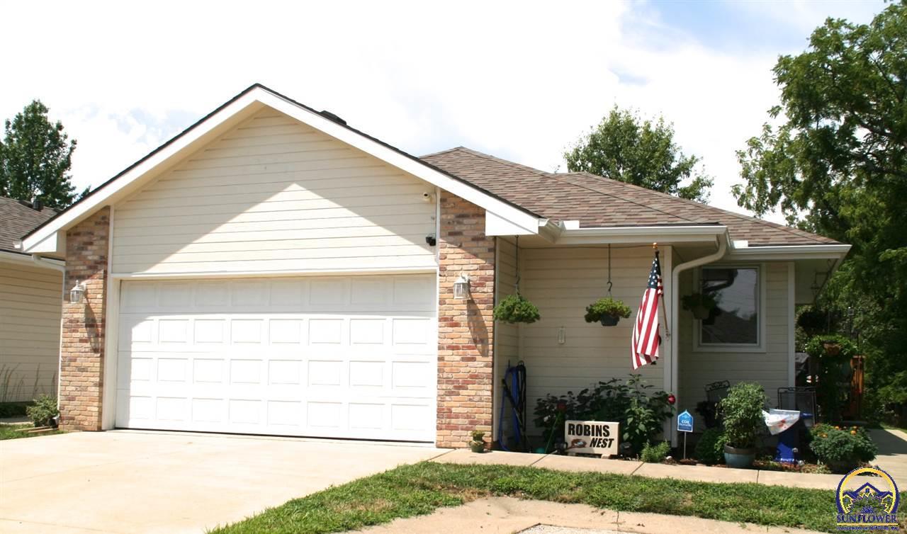Property Photo: 1401 SW Woodhull Ct KS 66604