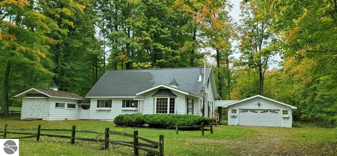Property Photo:  23730 Cadillac Highway  MI 49625 