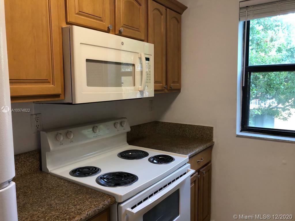 Property Photo:  15530 SW 80th St C-212  FL 33193 