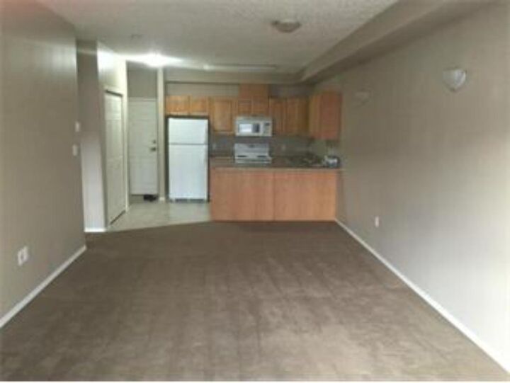 Property Photo: 9810 94 Street #201 AB T8S 0A1
