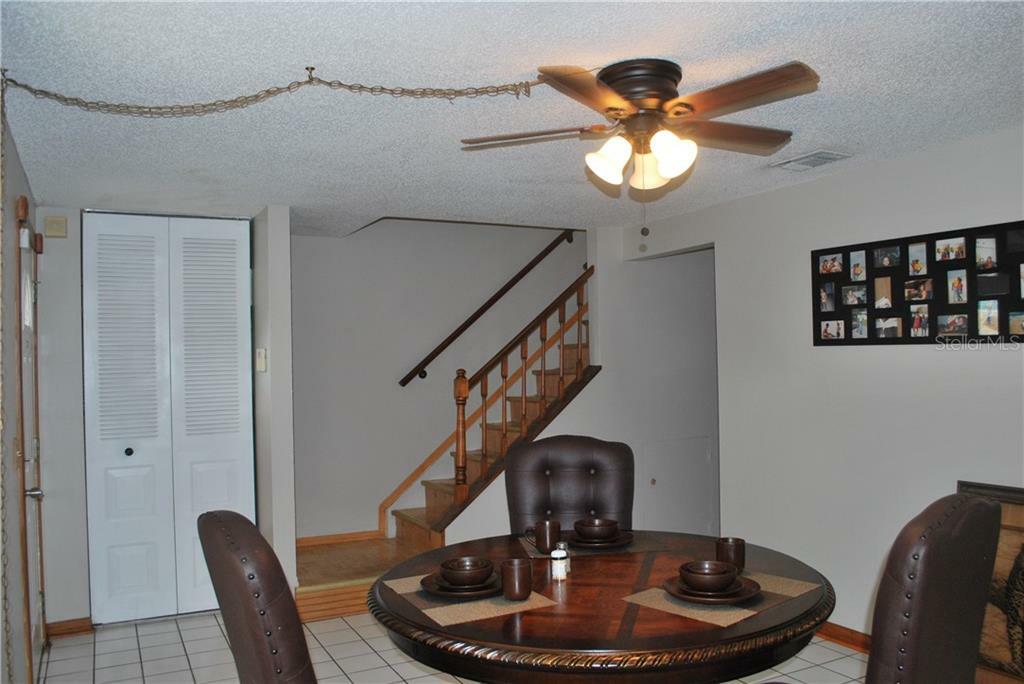 Property Photo:  4918 Silver Oaks Village F  FL 32808 