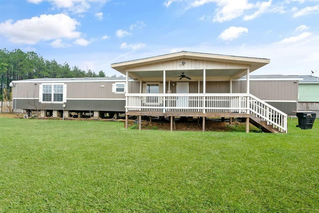Property Photo:  57 County Road 3546  TX 77327 
