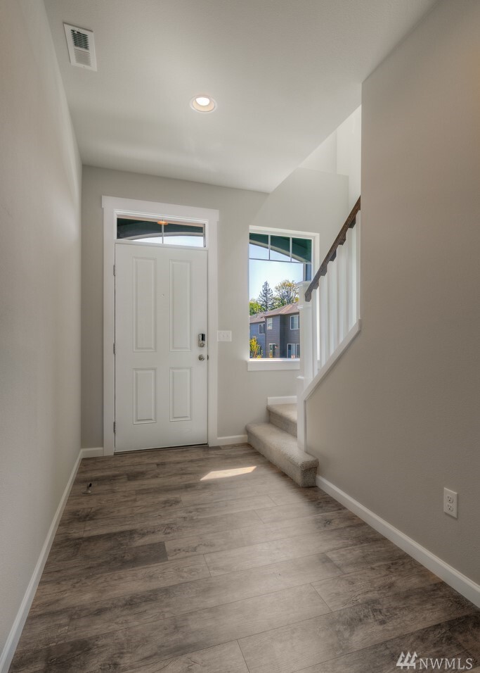 Property Photo:  2918 108th Place NE C144  WA 98258 