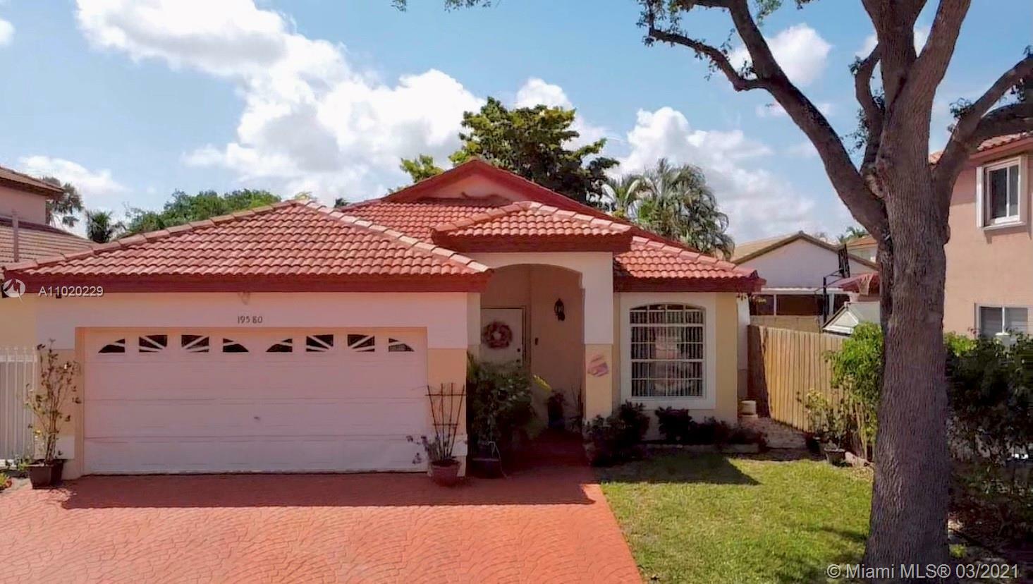 Property Photo:  19580 NW 82nd Ct  FL 33015 