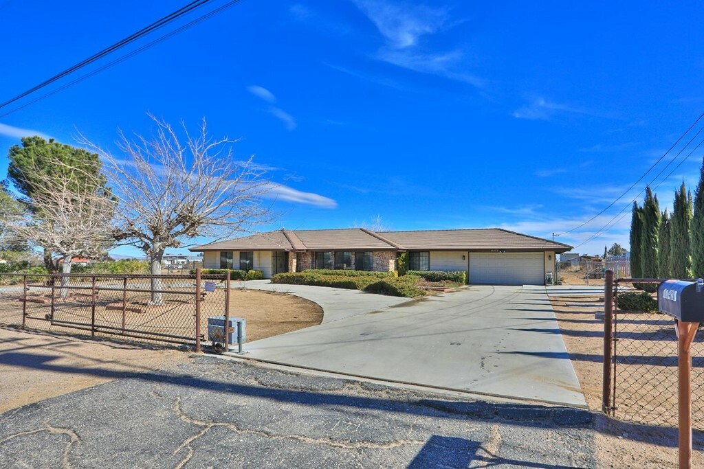 Property Photo:  11427 Pinon Avenue  CA 92345 