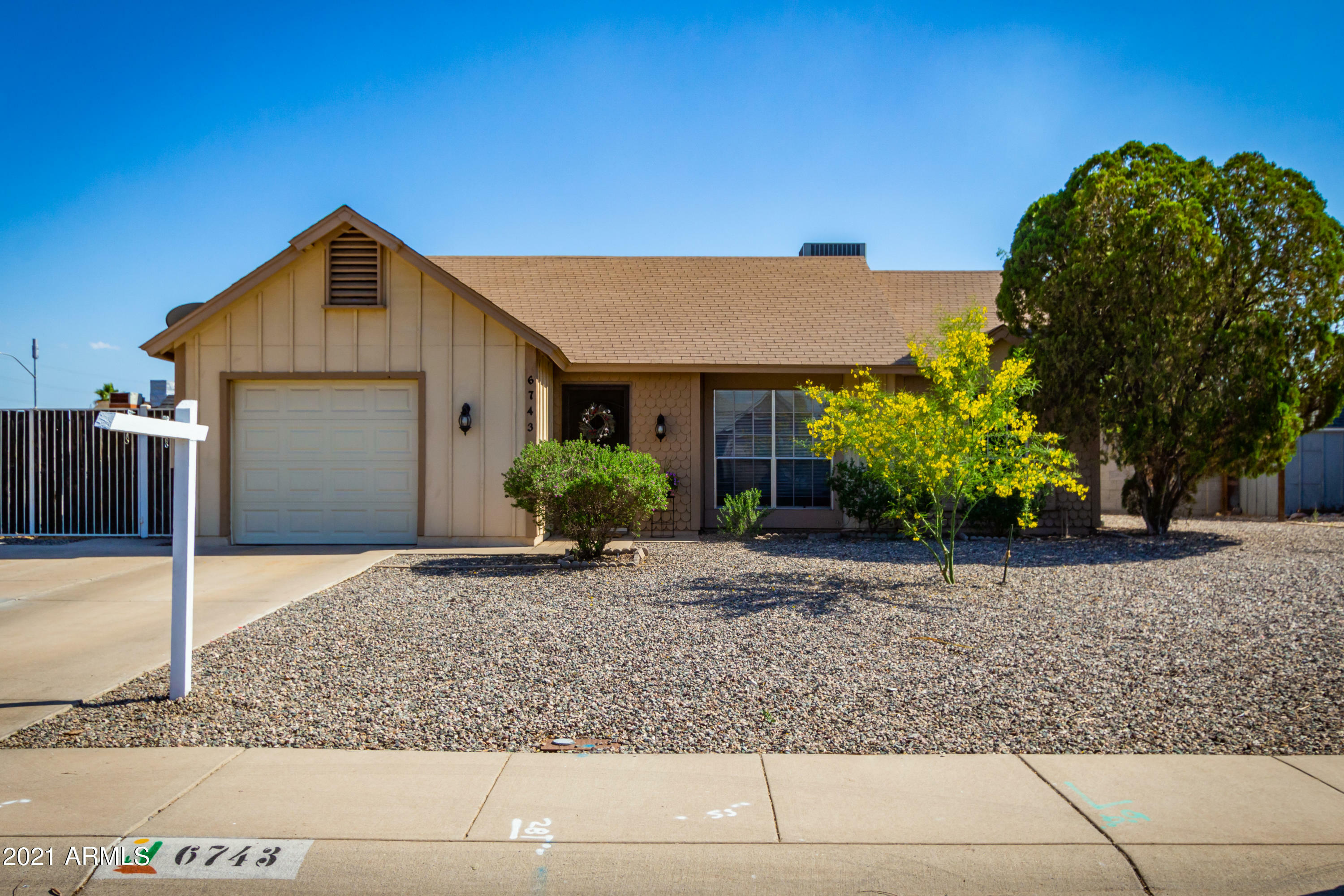 Property Photo:  6743 W Turquoise Avenue  AZ 85345 