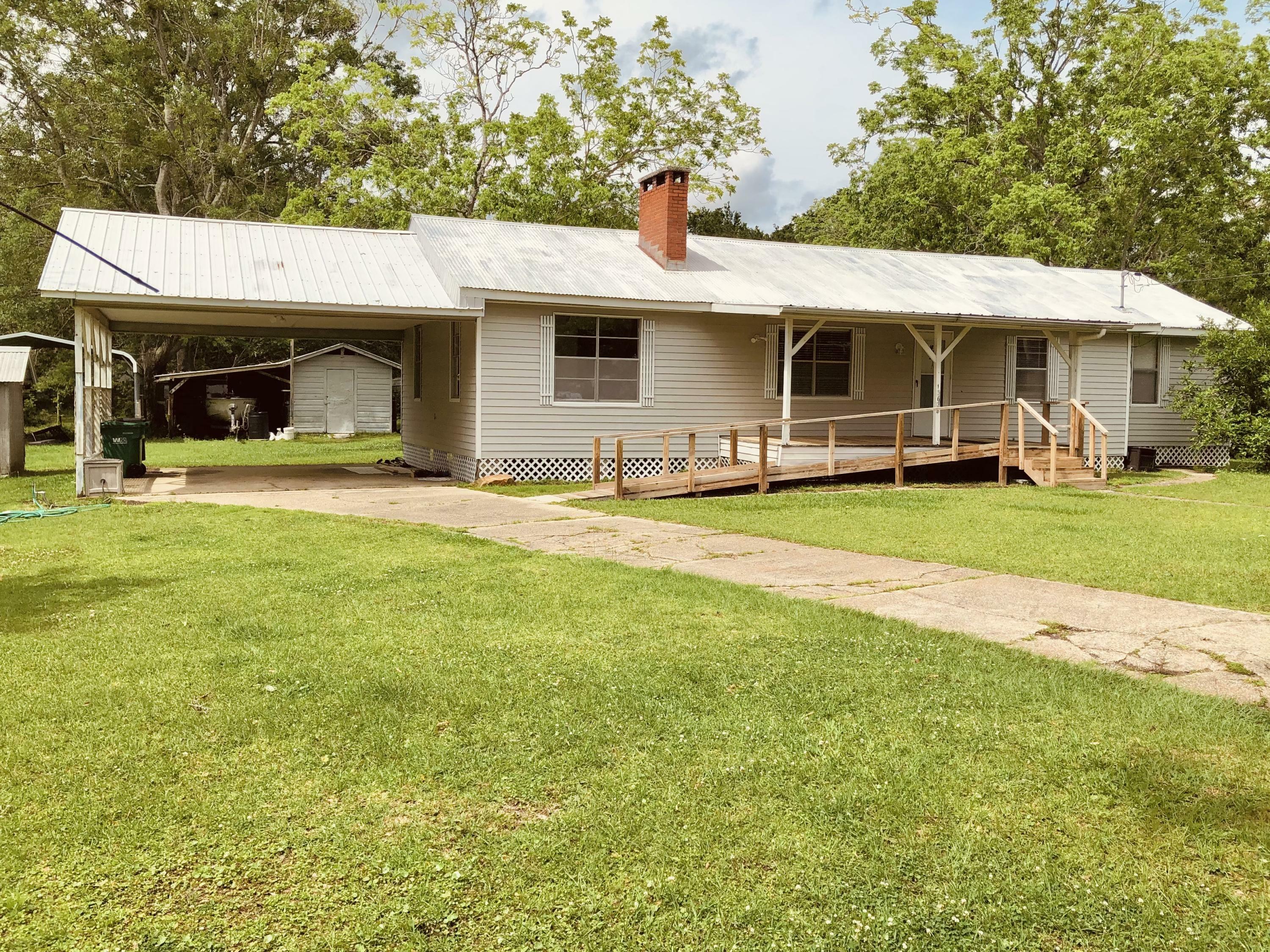 Property Photo:  13628 Elzy Byrd Road  MS 39564 