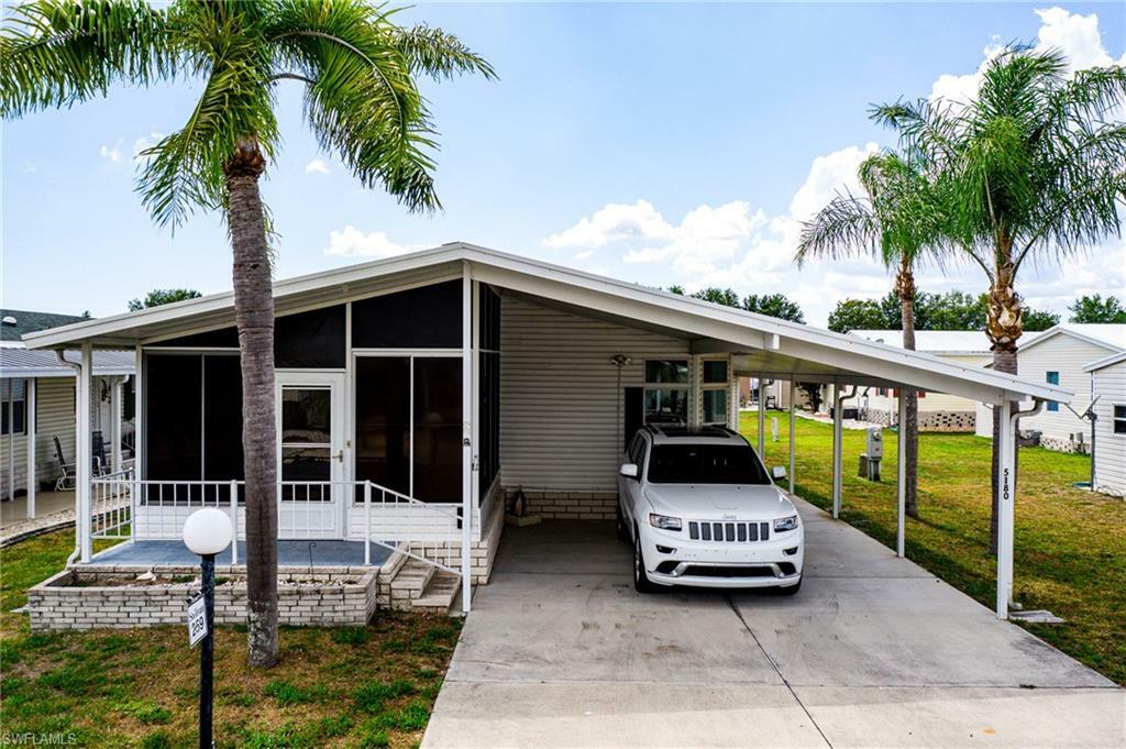 Property Photo:  5180 Silk Oak Avenue  FL 33905 