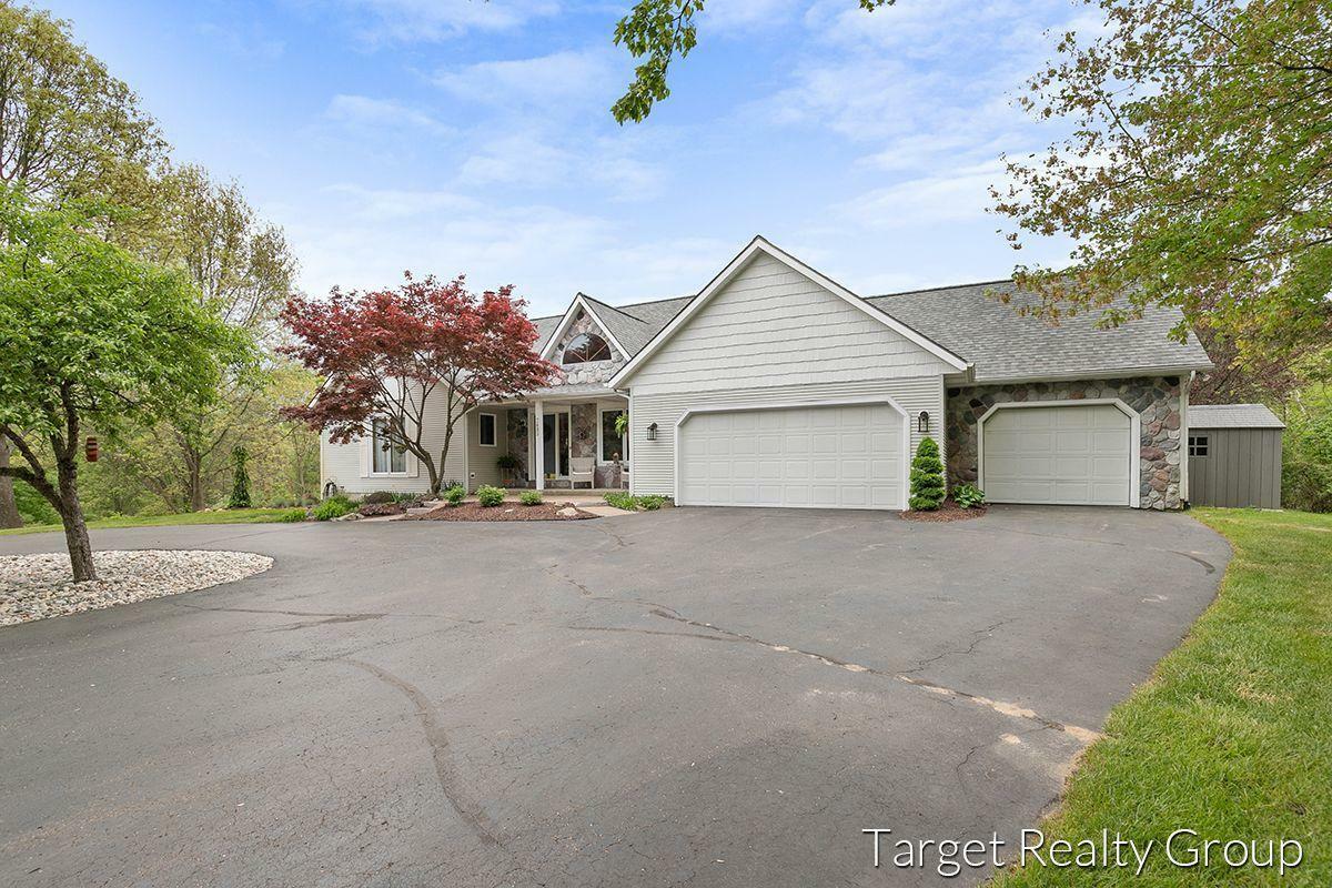 Property Photo: 7685 Belmont Avenue NE MI 49306