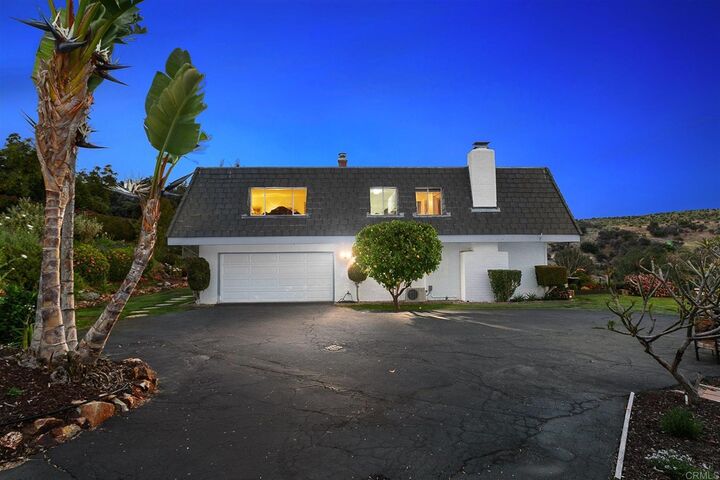 Property Photo:  9431 W Lilac Road  CA 92026 